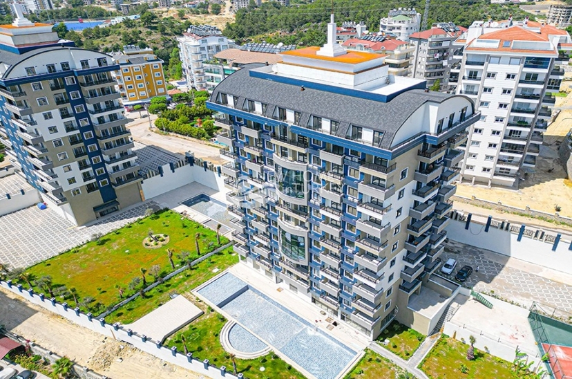 Lyxig 1+1 lägenhet med havs- och bergsutsikt i Avsallar, Alanya