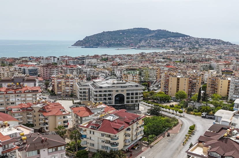 Luxuriöse 3+1 Wohnung mit Bergblick im Zentrum von Alanya