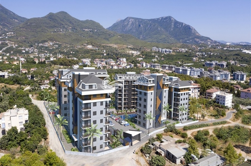 Lyxig 1+1 lägenhet med utsikt över bergen i Alanya - Oba
