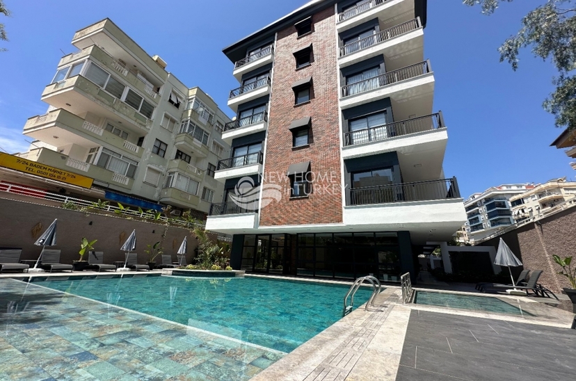 Luxuriöses 1+1 Apartment mit Bergblick im Zentrum von Alanya