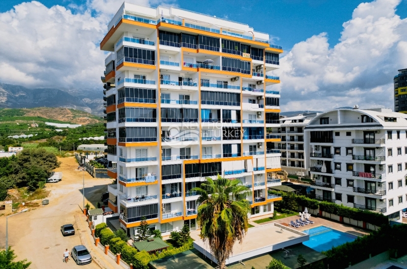 Modern 1+1 lägenhet med bergsutsikt i Alanya