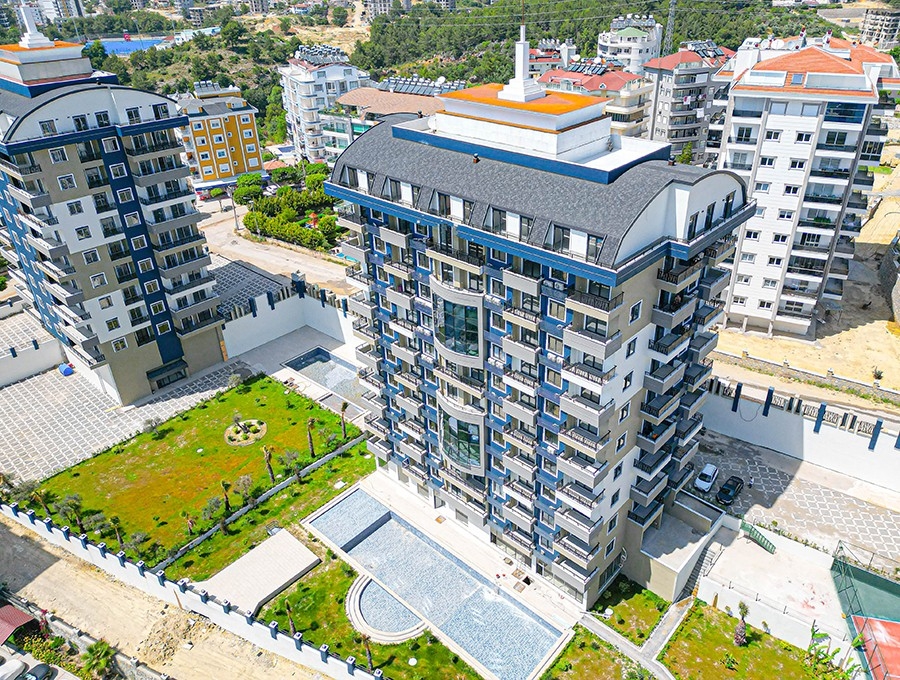 Lyxig 1+1 lägenhet med havs- och bergsutsikt i Avsallar, Alanya