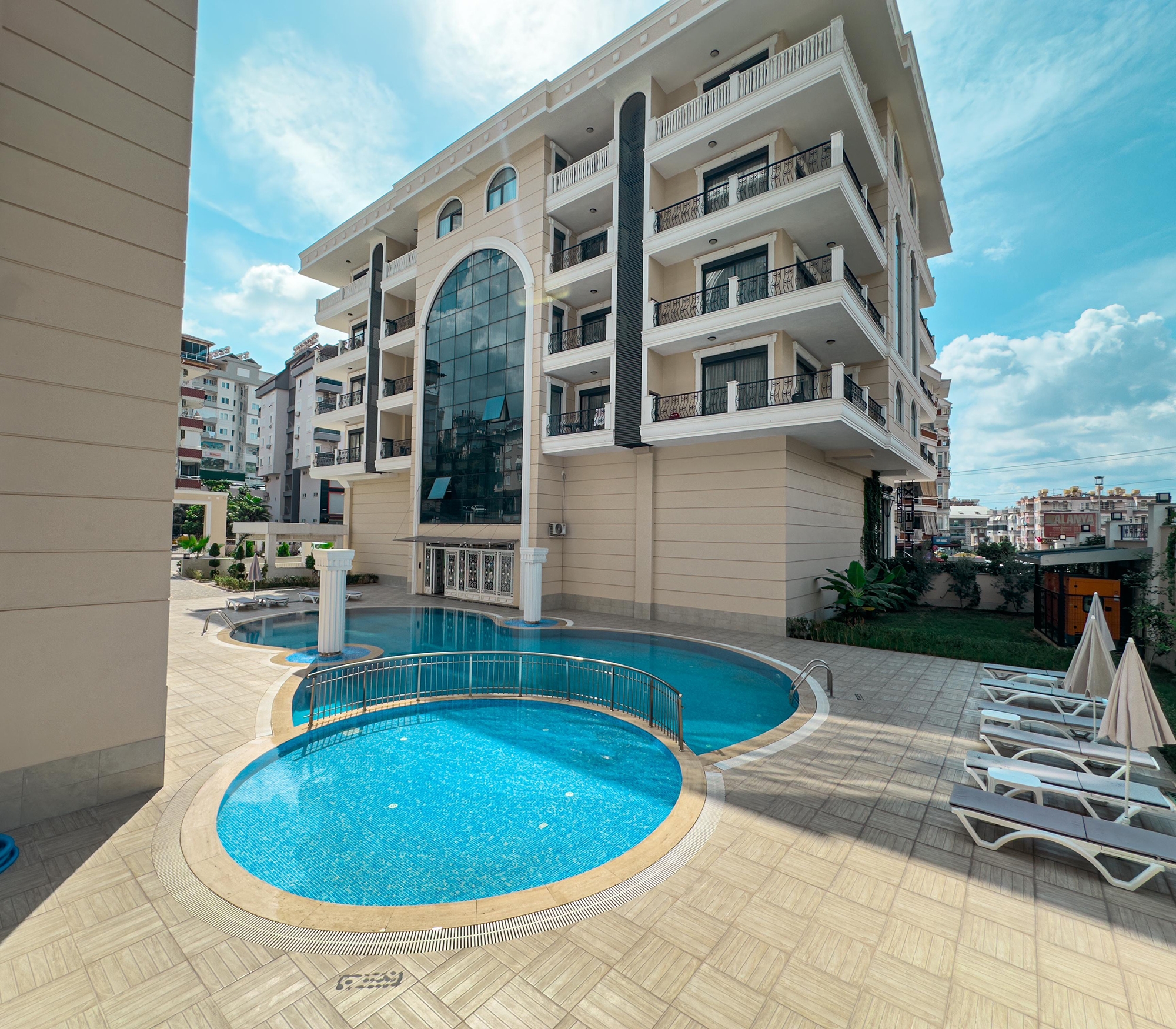 Luxuriöse 3+1 Wohnung mit Bergblick im Zentrum von Alanya
