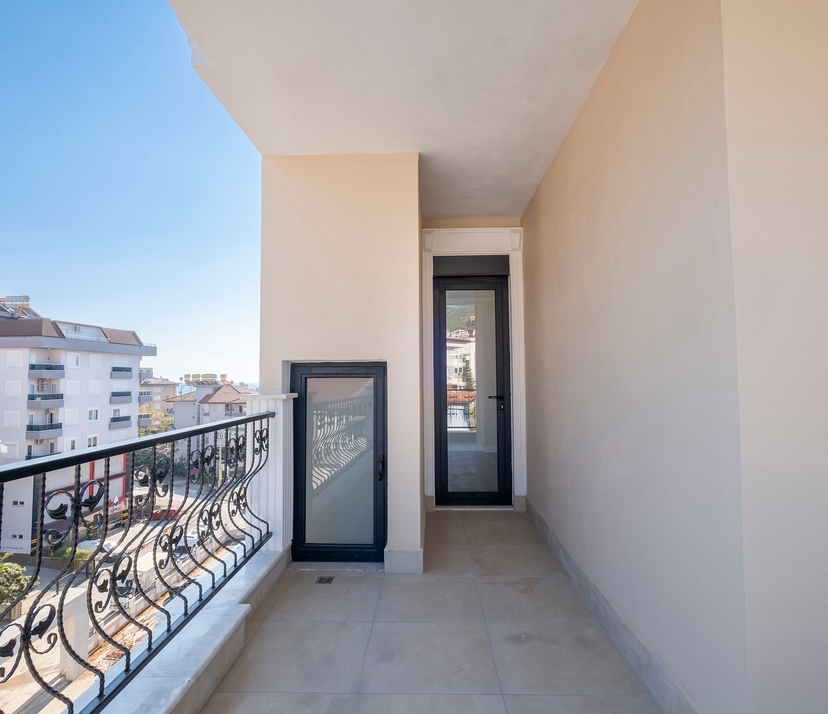 Luxuriöse 3+1 Wohnung mit Bergblick im Zentrum von Alanya