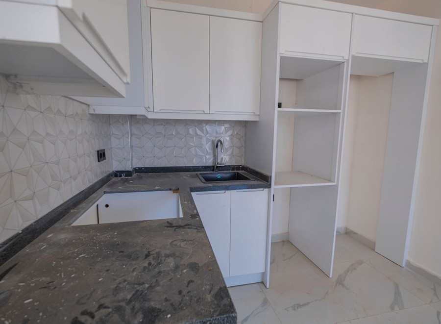 Lyxig 1+1 lägenhet med bergsutsikt i Mahmutlar, Alanya