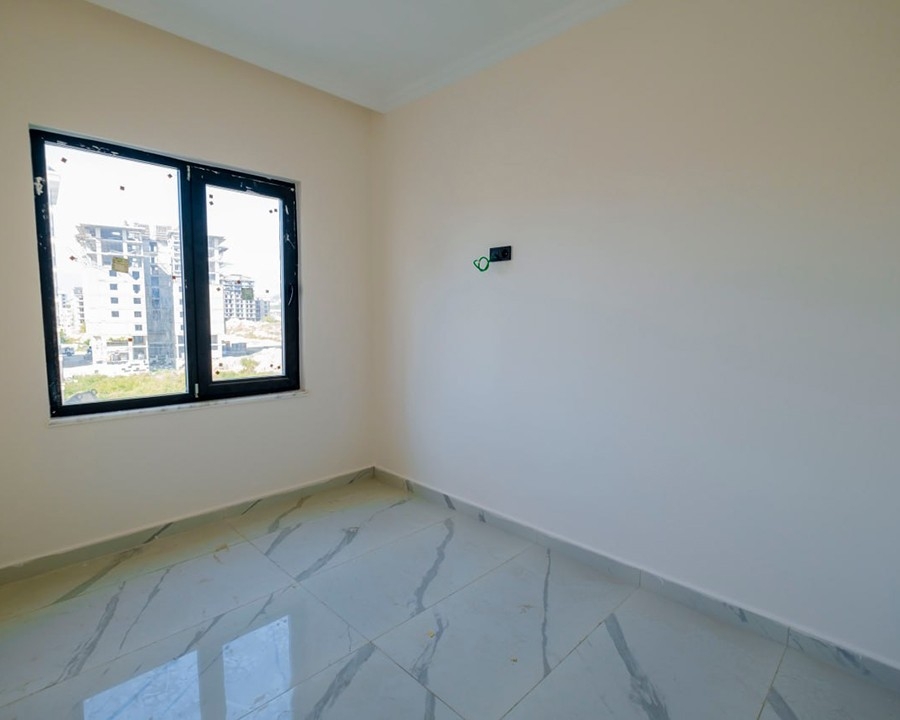 Lyxig 1+1 lägenhet med bergsutsikt i Mahmutlar, Alanya