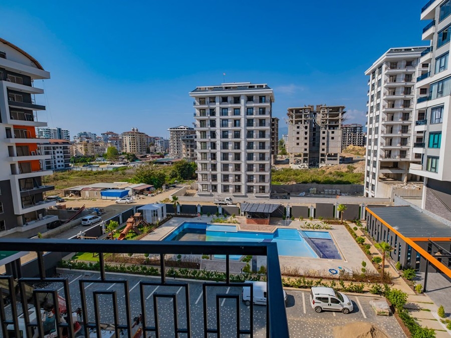 Lyxig 1+1 lägenhet med bergsutsikt i Mahmutlar, Alanya