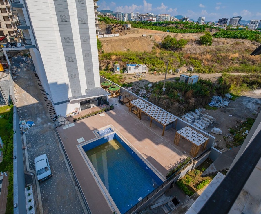 Lyxig 1+1 lägenhet med bergsutsikt i Mahmutlar, Alanya