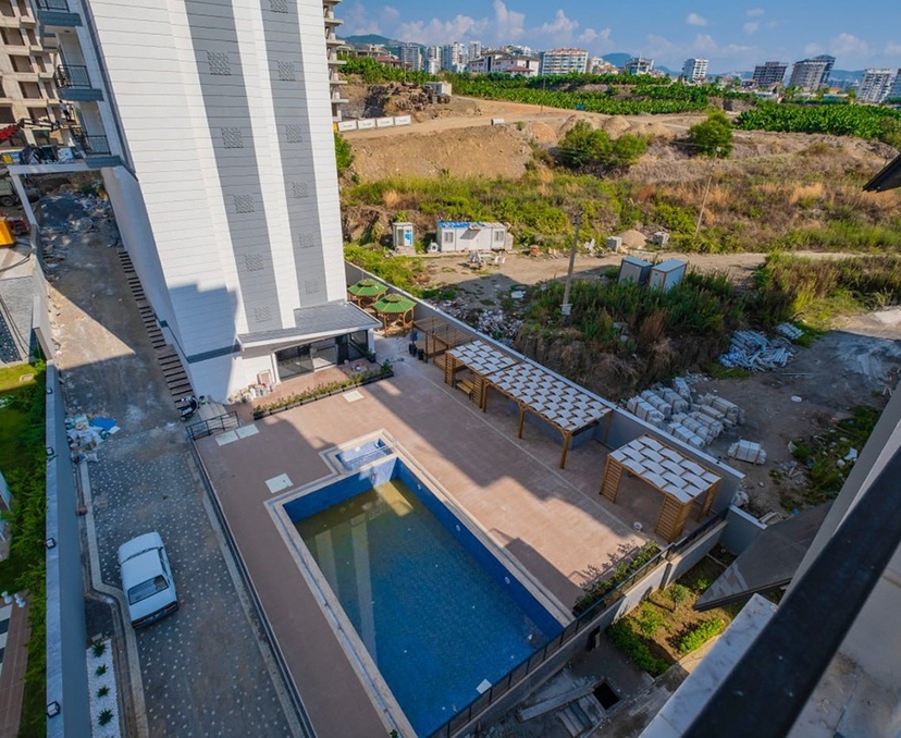 Lyxig 1+1 lägenhet med bergsutsikt i Mahmutlar, Alanya