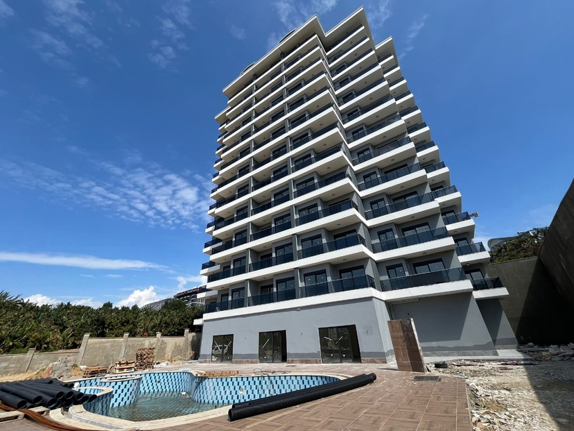 Moderne 1+1 Wohnung mit Bergblick und luxuriösen Annehmlichkeiten