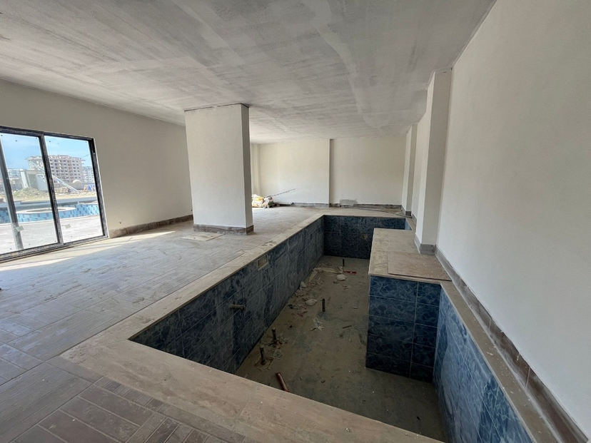 Moderne 1+1 Wohnung mit Bergblick und luxuriösen Annehmlichkeiten