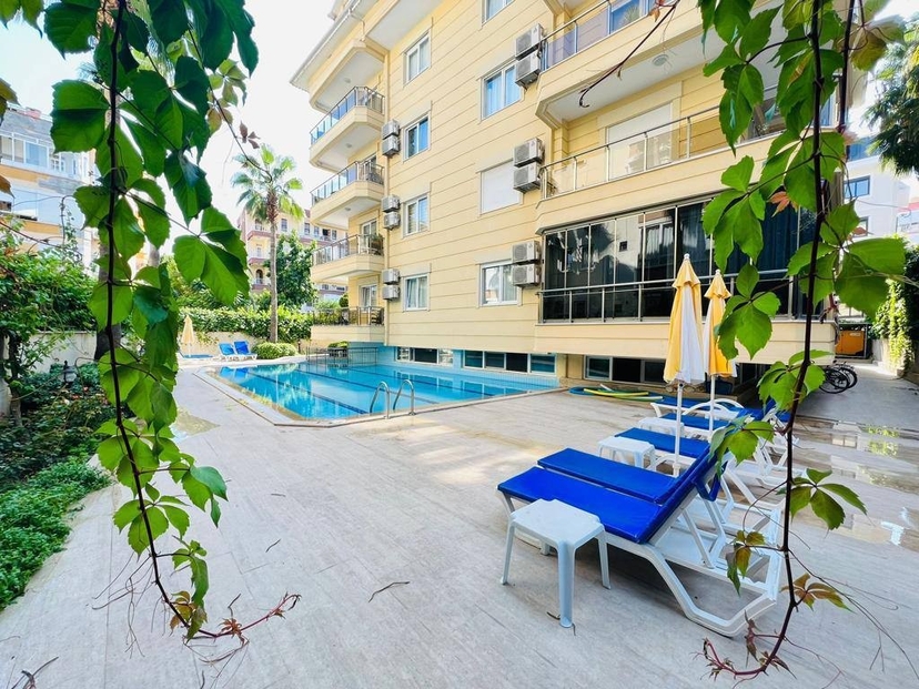 Luxuriöses 1+1 Apartment mit Bergblick im Zentrum von Alanya
