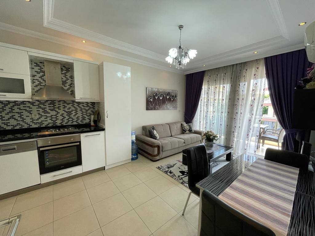 Luxuriöses 1+1 Apartment mit Bergblick im Zentrum von Alanya