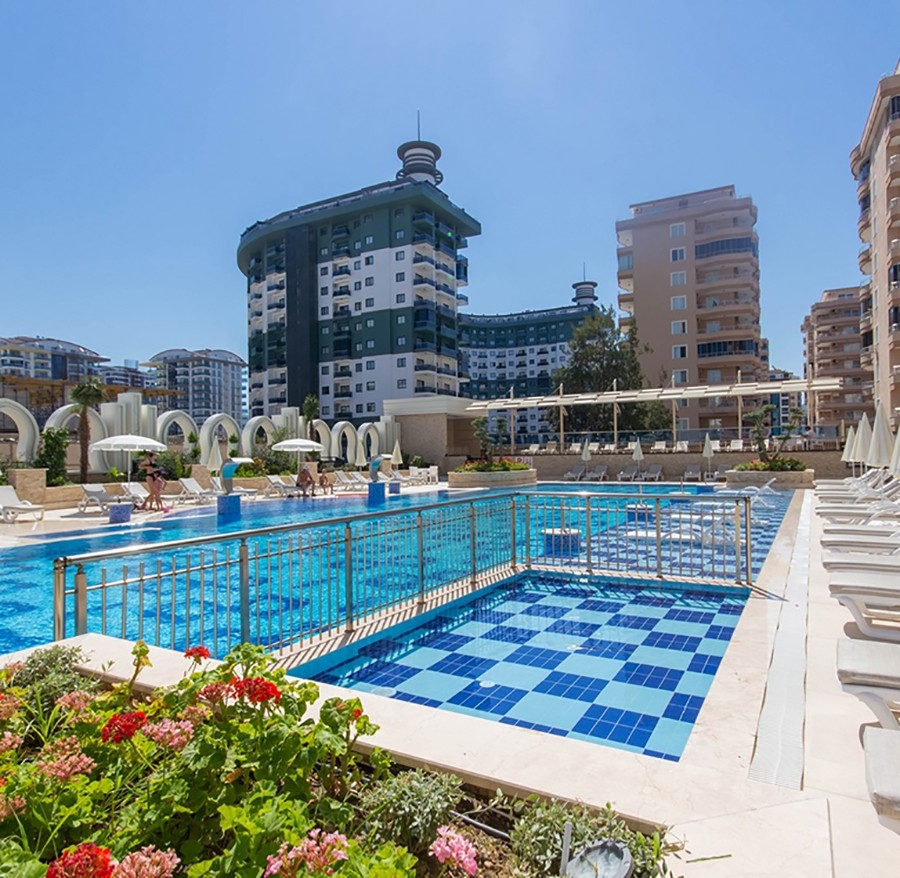 Lyxig 1+1 lägenhet med havs- och bergsutsikt i Alanya