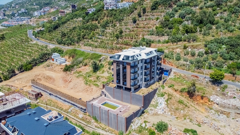 Luksuriøs 1+1 Lejlighed med Hav- og Bjergudsigt, Alanya Center