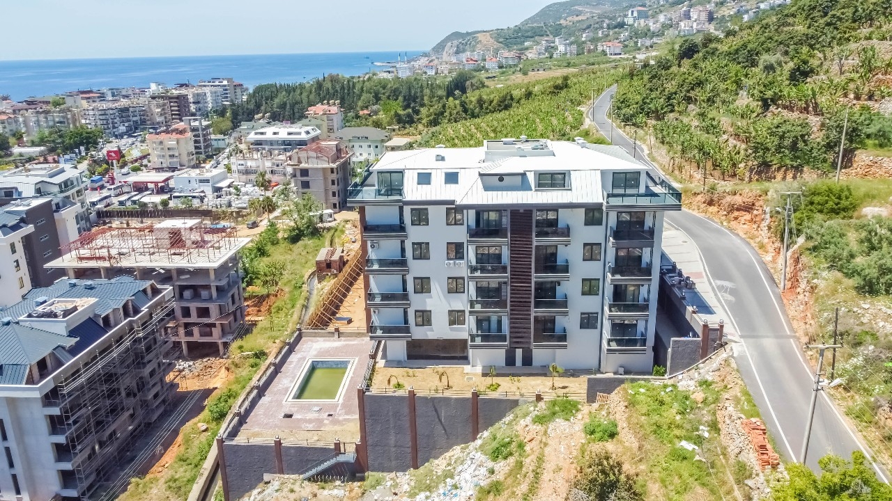 Luksuriøs 1+1 Lejlighed med Hav- og Bjergudsigt, Alanya Center