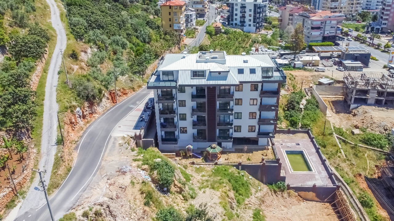 Luksuriøs 1+1 Lejlighed med Hav- og Bjergudsigt, Alanya Center