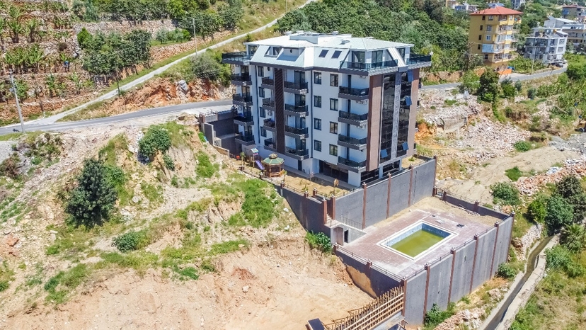 Luksuriøs 1+1 Lejlighed med Hav- og Bjergudsigt, Alanya Center