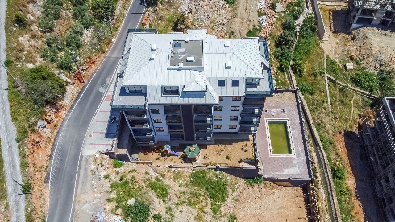 Luksuriøs 1+1 Lejlighed med Hav- og Bjergudsigt, Alanya Center
