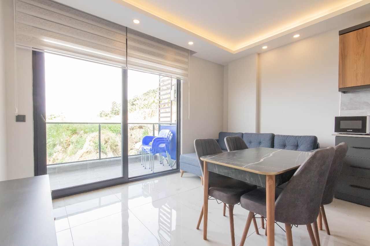 Luksuriøs 1+1 Lejlighed med Hav- og Bjergudsigt, Alanya Center