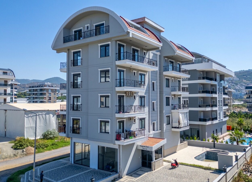 Bergblick 1+1 Wohnung in Kargicak, Alanya