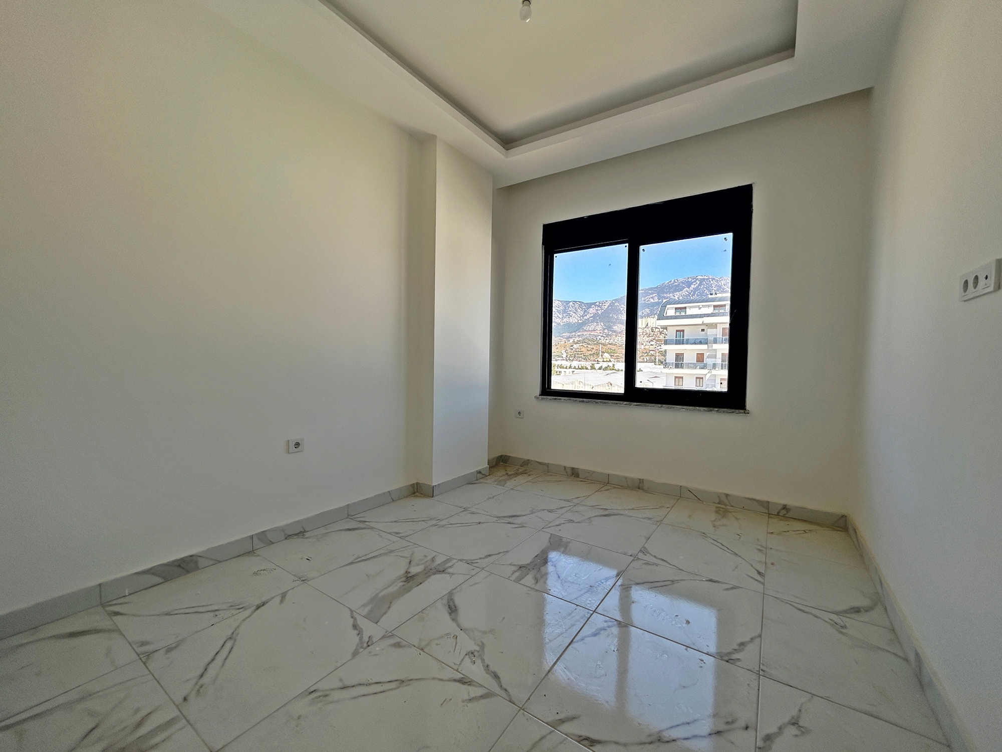Bergblick 1+1 Wohnung in Kargicak, Alanya