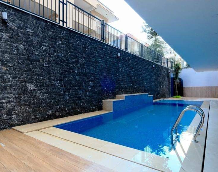Luxuriöses 1+1 Apartment mit Bergblick im Zentrum von Alanya