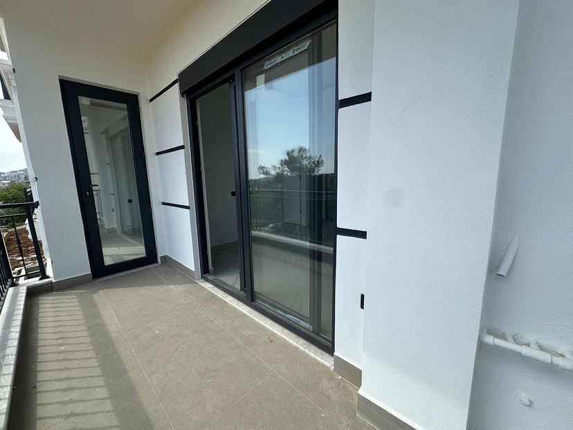 Linna- ja vuorinäkymillä varustettu 1+1 asunto Oba, Alanya