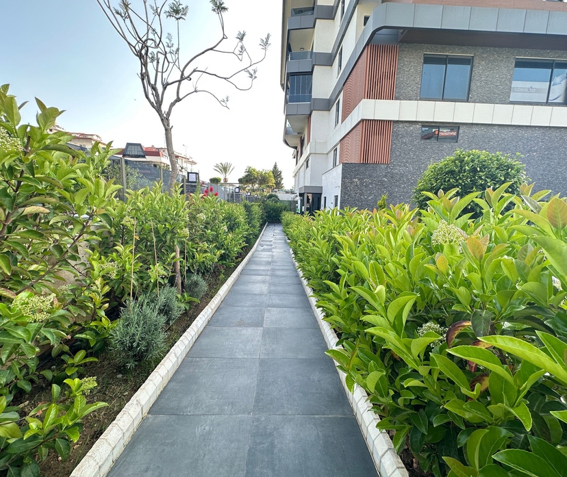 Moderne 1+1 Lejlighed med Hav- og Bjergudsigt i Kestel, Alanya