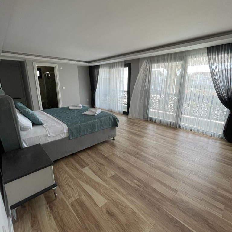 Ylellinen 6+1 vuoristonäköalalla varustettu huvila Calis Beachilla, Fethiyessä