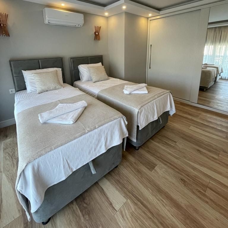 Ylellinen 6+1 vuoristonäköalalla varustettu huvila Calis Beachilla, Fethiyessä