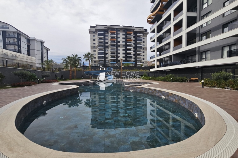 Современная 1+1 квартира с видом на горы в Авсалларе, Алания